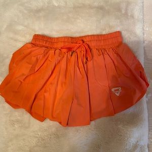 Orange flowy shorts